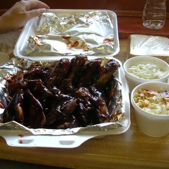 Smoki O's signature dishes Pork Ribs, Rib Tips, Snoots (a St. Louis specialty of pig snout), Pulled Pork Sandwich.